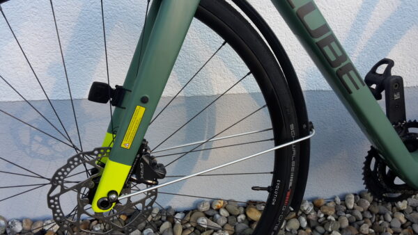 Green bicycle mudguard stays
